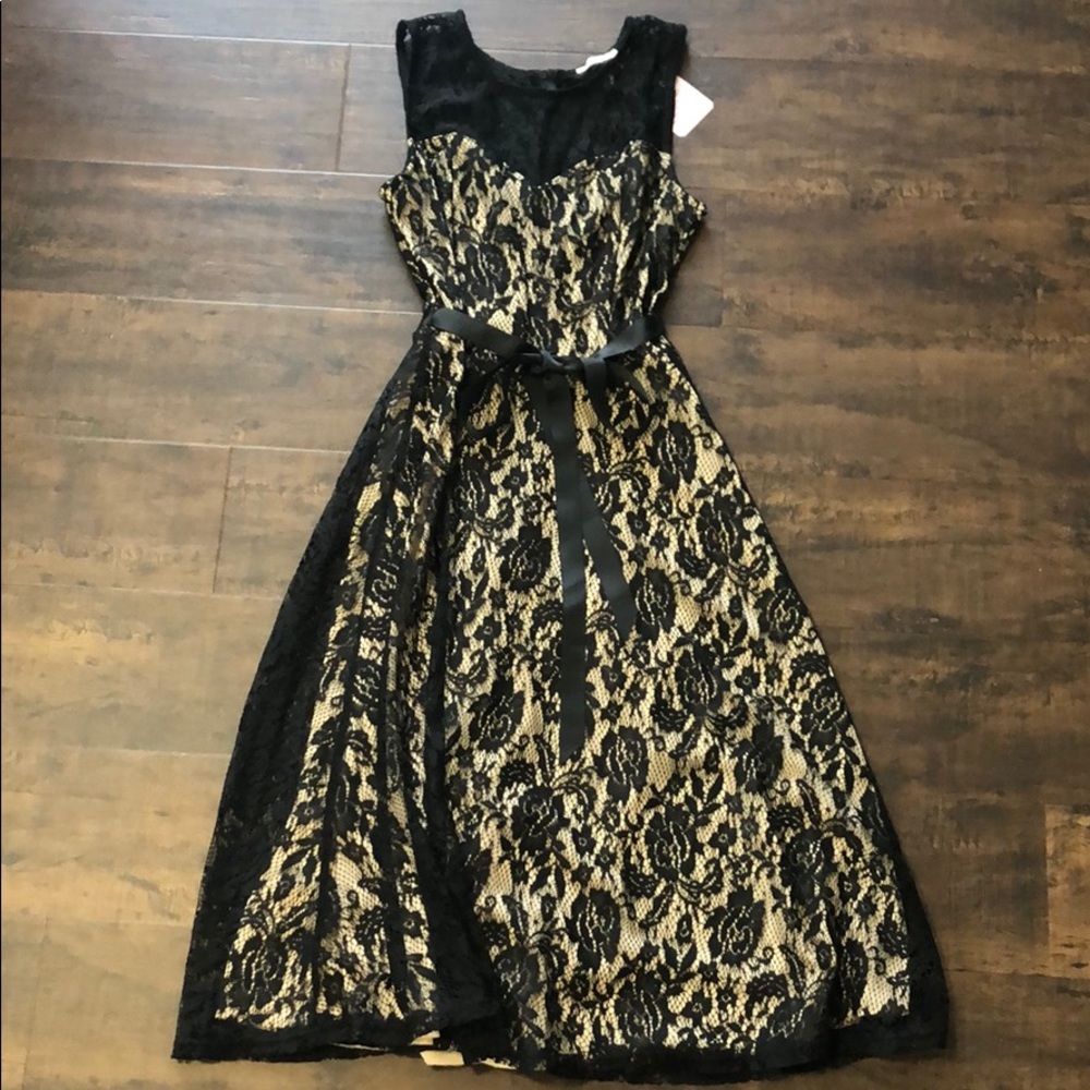 Brand new black and cream lace dress